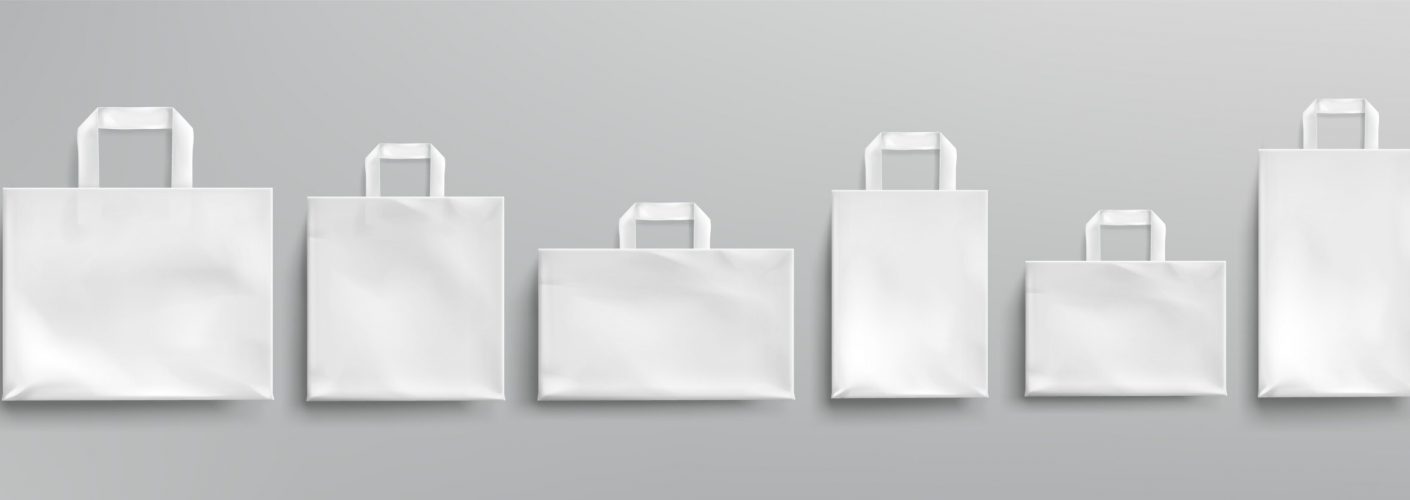 White paper eco bags different shapes. Vector realistic mockup of blank packets with handles isolated on gray background. Template for corporate design on cardboard bag for store or market